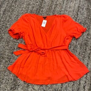 NWT Torrid faux wrap peplum top with tie sz 0 large/12